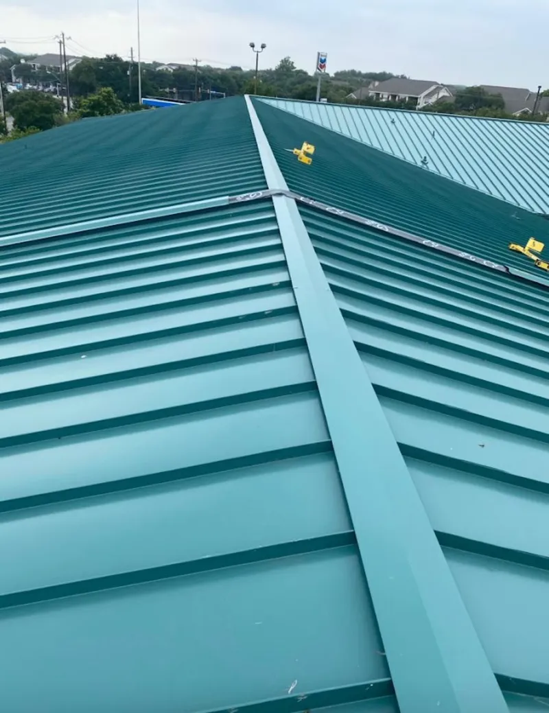 Green commercial metal roof ridge and valley for Metal Roof Repair in Hammond