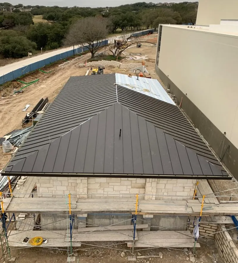 Metal roof new construction with scaffolding in Hammond
