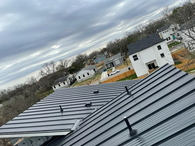 Standing seam metal roof panels with vents for Skylight Repair in Hammond